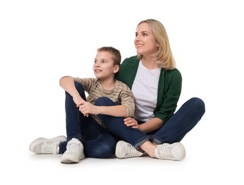 Happy mother and son on white background