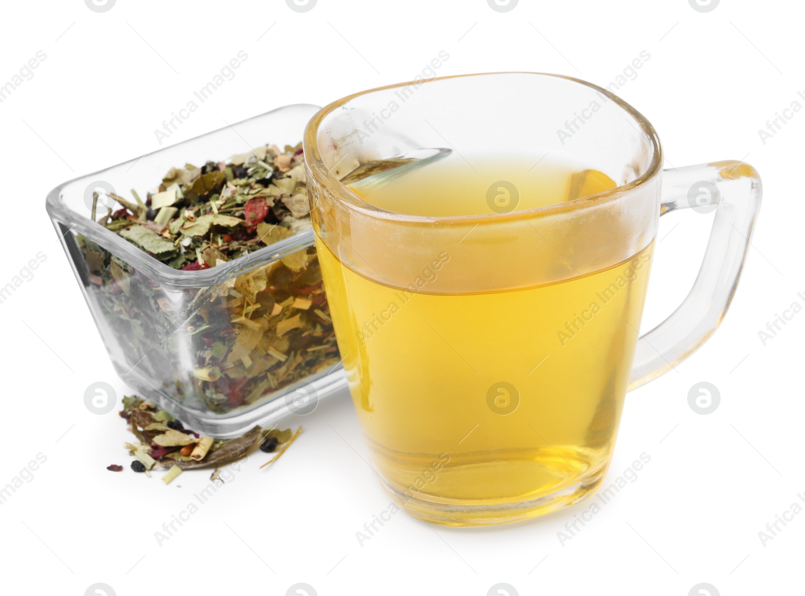 Photo of Delicious herbal tea and dry leaves isolated on white