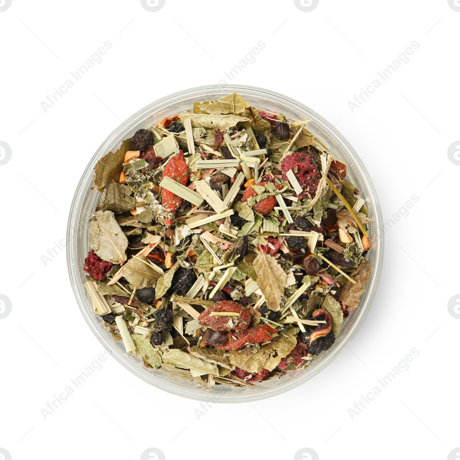 Photo of Dry herbal tea brew in jar isolated on white, top view