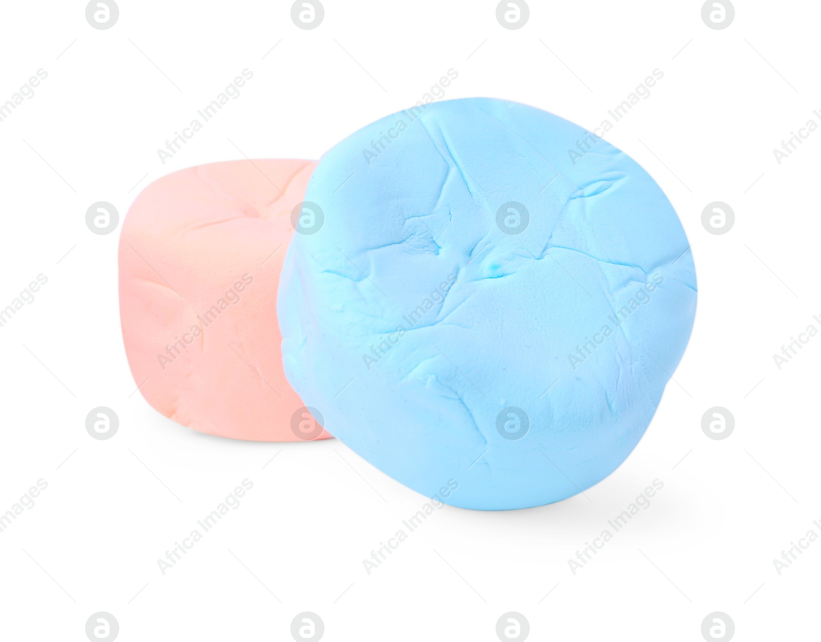 Photo of Pale pink and light blue play dough isolated on white