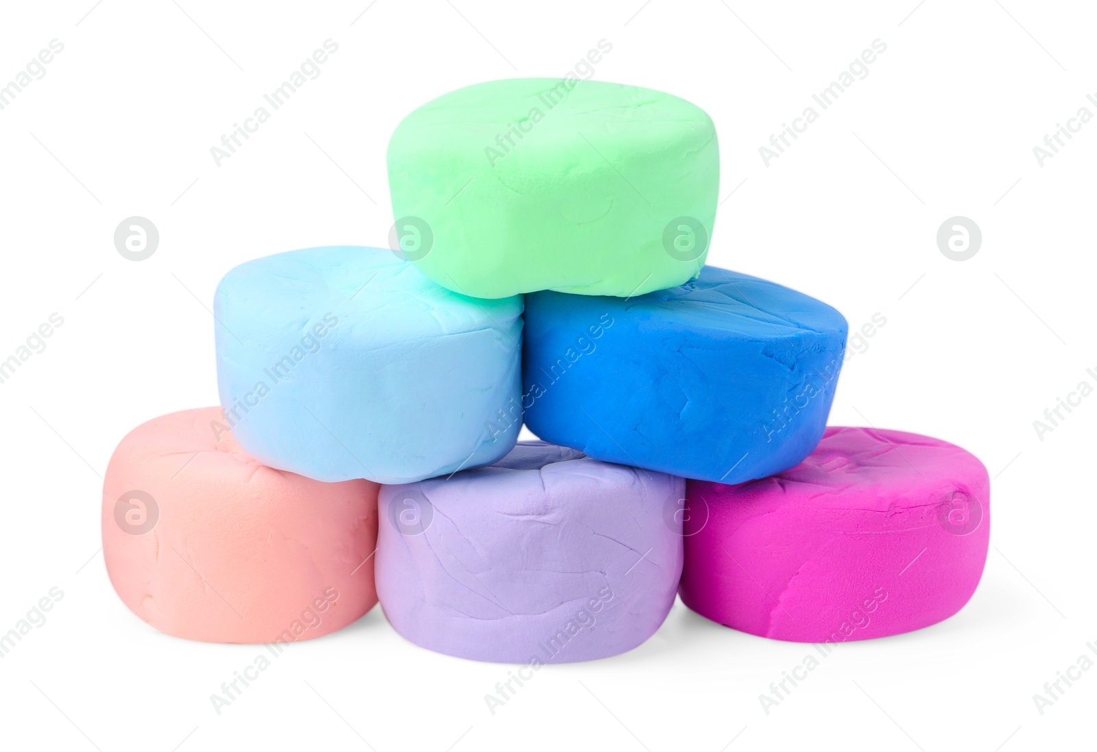 Photo of Different colorful play dough isolated on white