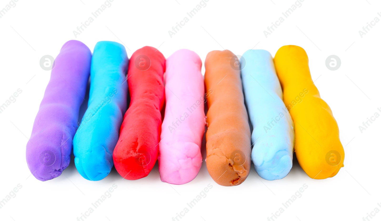 Photo of Different colorful play dough isolated on white