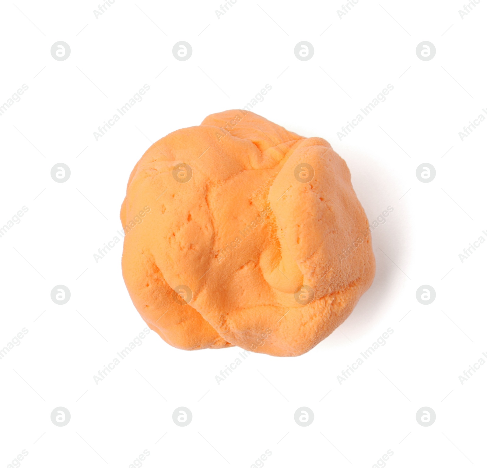 Photo of Bright orange play dough isolated on white, top view