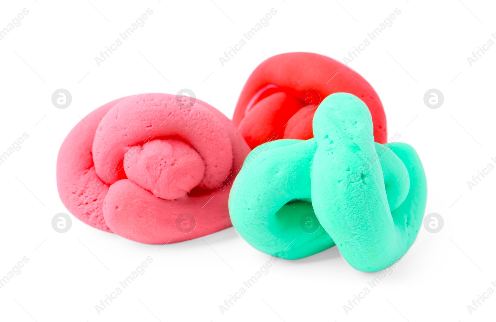 Photo of Different colorful play dough isolated on white