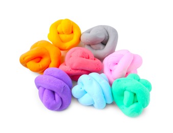 Photo of Different colorful play dough isolated on white