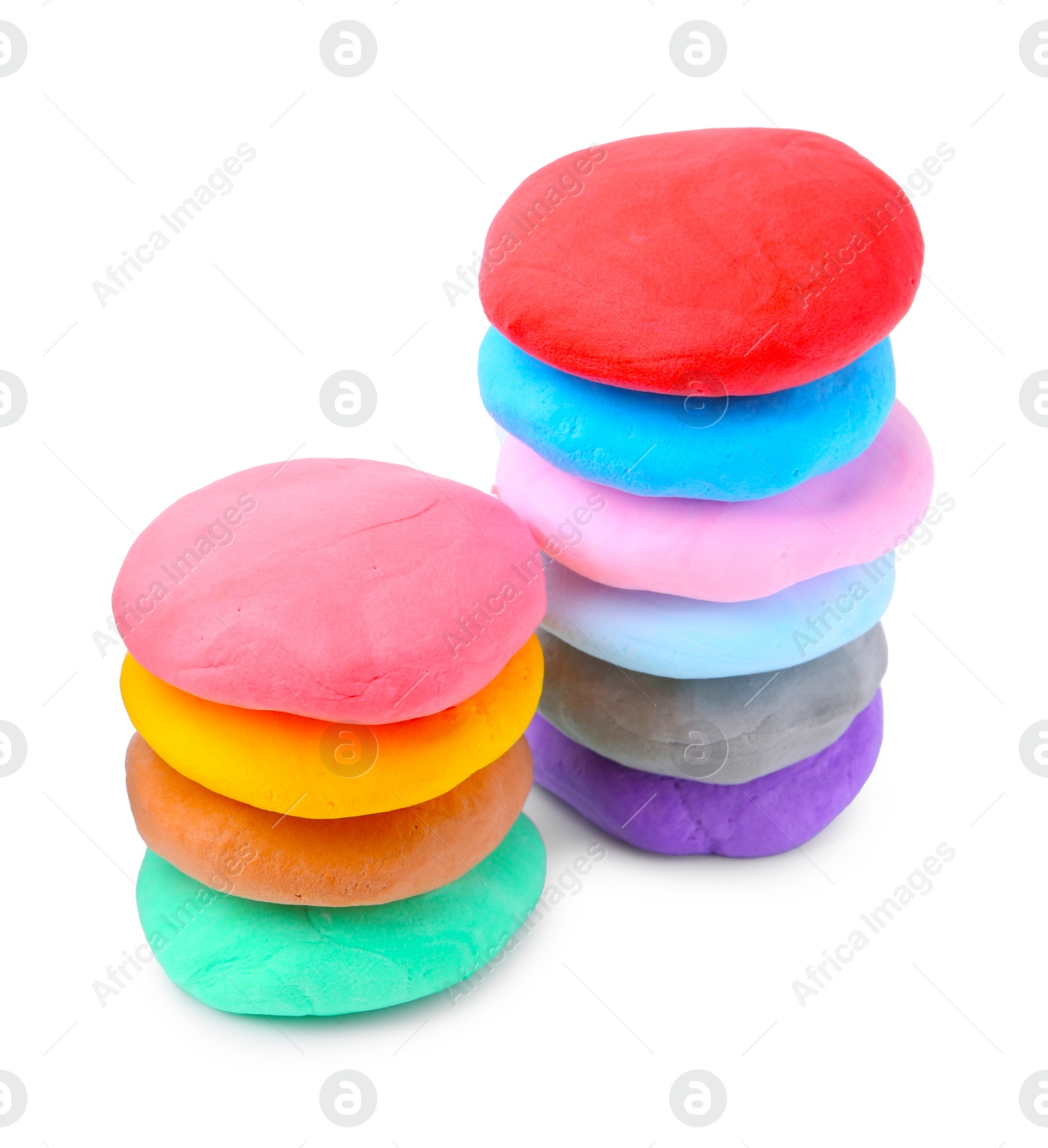 Photo of Different colorful play dough isolated on white