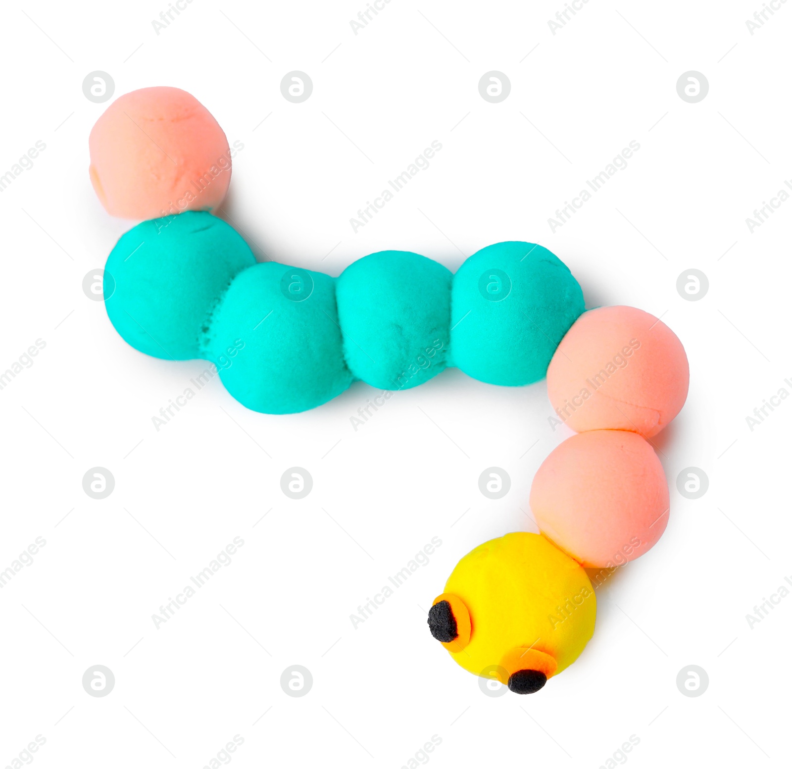 Photo of Caterpillar made from play dough isolated on white, top view