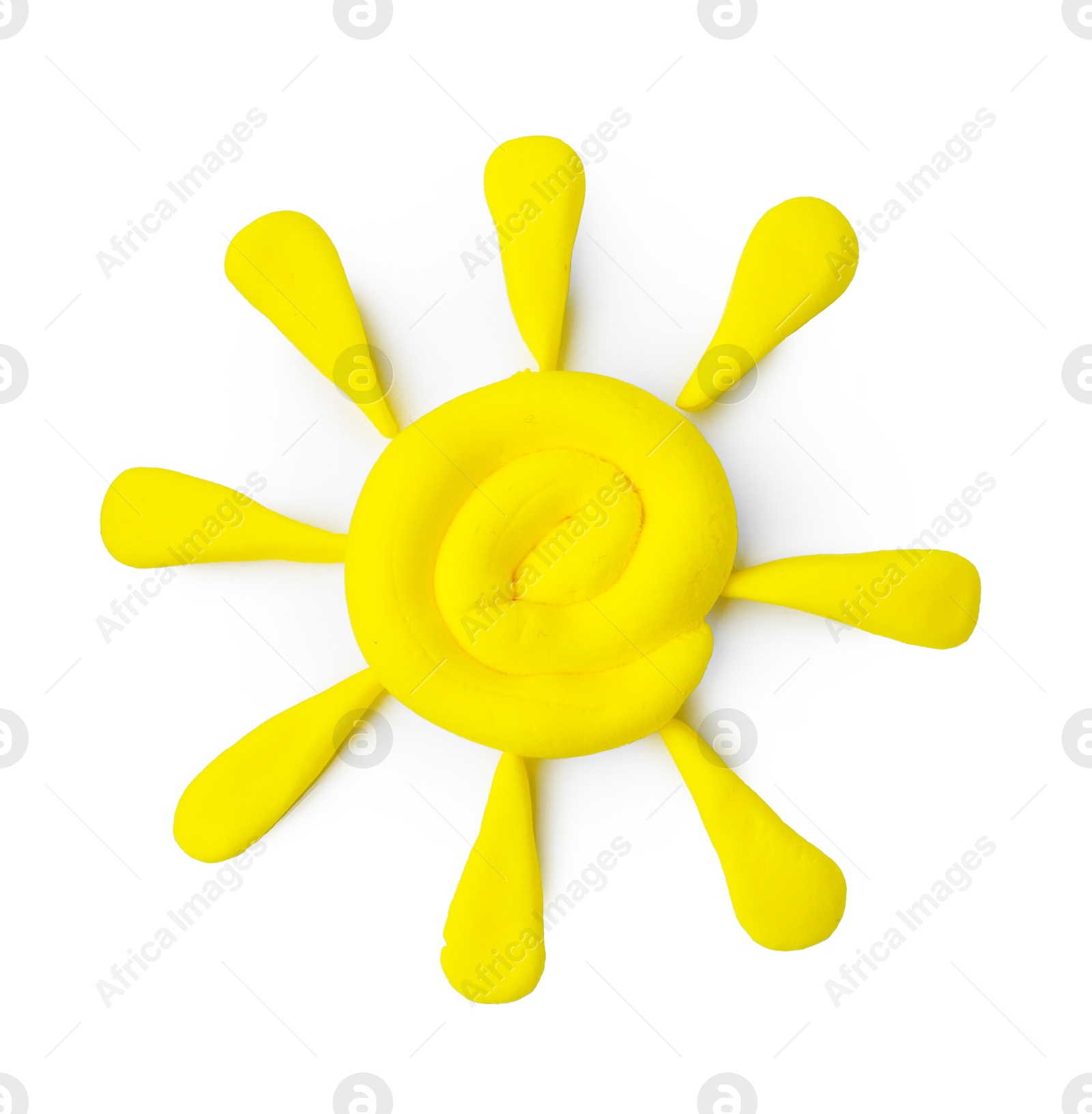 Photo of Sun made from play dough on white background, top view