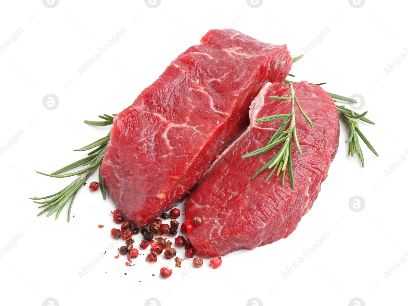 Photo of Pieces of raw beef meat and spices isolated on white, above view