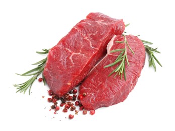 Photo of Pieces of raw beef meat and spices isolated on white, above view