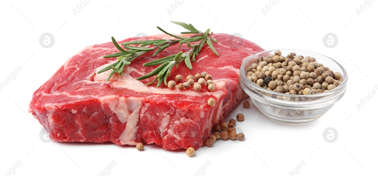 Photo of Piece of raw beef meat and spices isolated on white