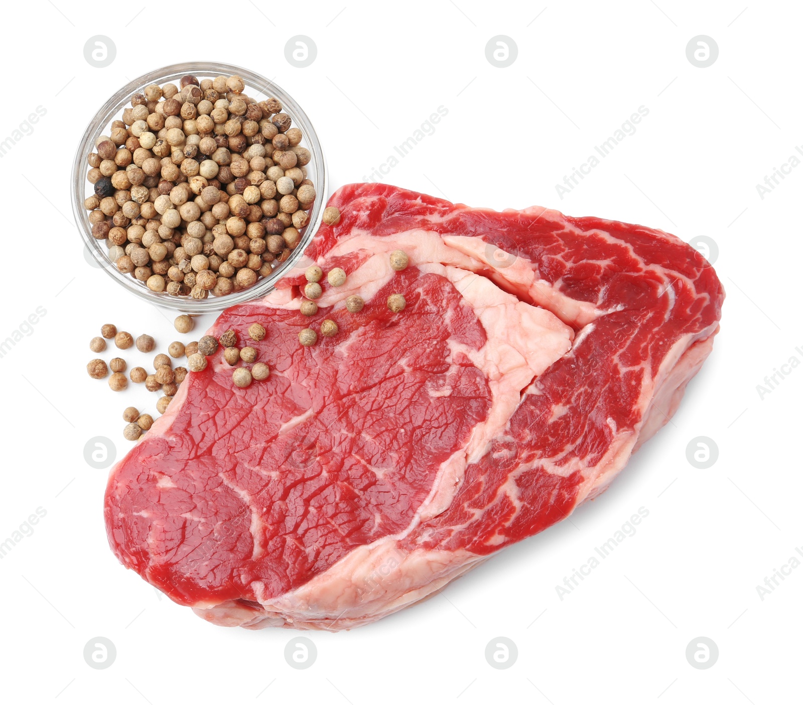 Photo of Piece of raw beef meat and spices isolated on white, top view