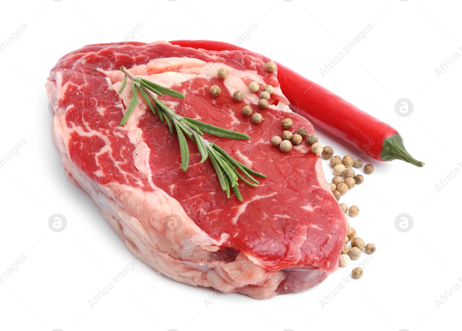 Photo of Piece of raw beef meat and spices isolated on white