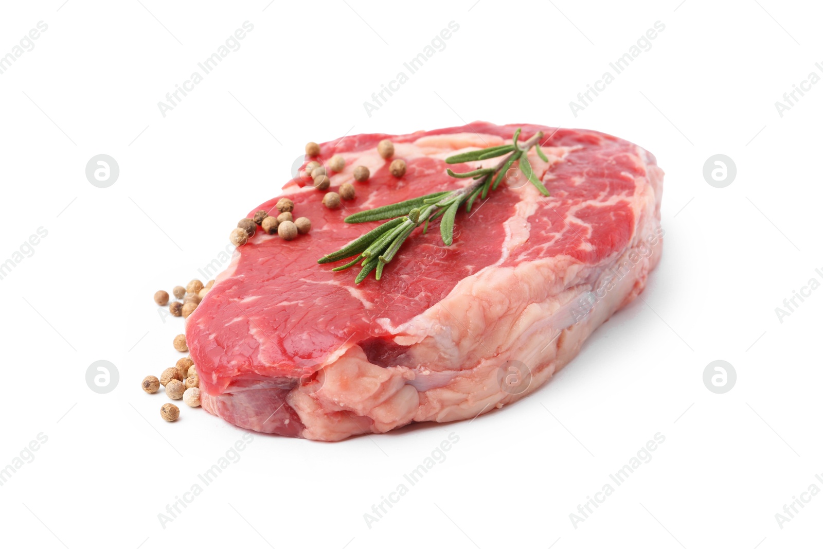 Photo of Piece of raw beef meat and spices isolated on white