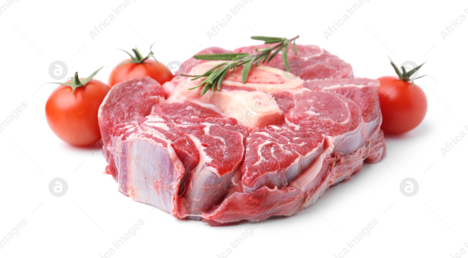 Photo of Piece of raw beef meat, rosemary and tomatoes isolated on white