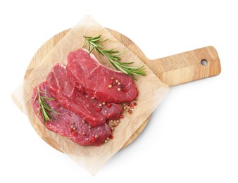 Photo of Pieces of raw beef meat, rosemary and peppercorns isolated on white, top view