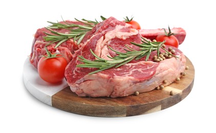 Photo of Pieces of raw beef meat, spices and tomatoes isolated on white