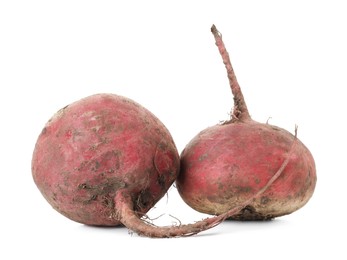 Photo of Two fresh ripe beetroots isolated on white