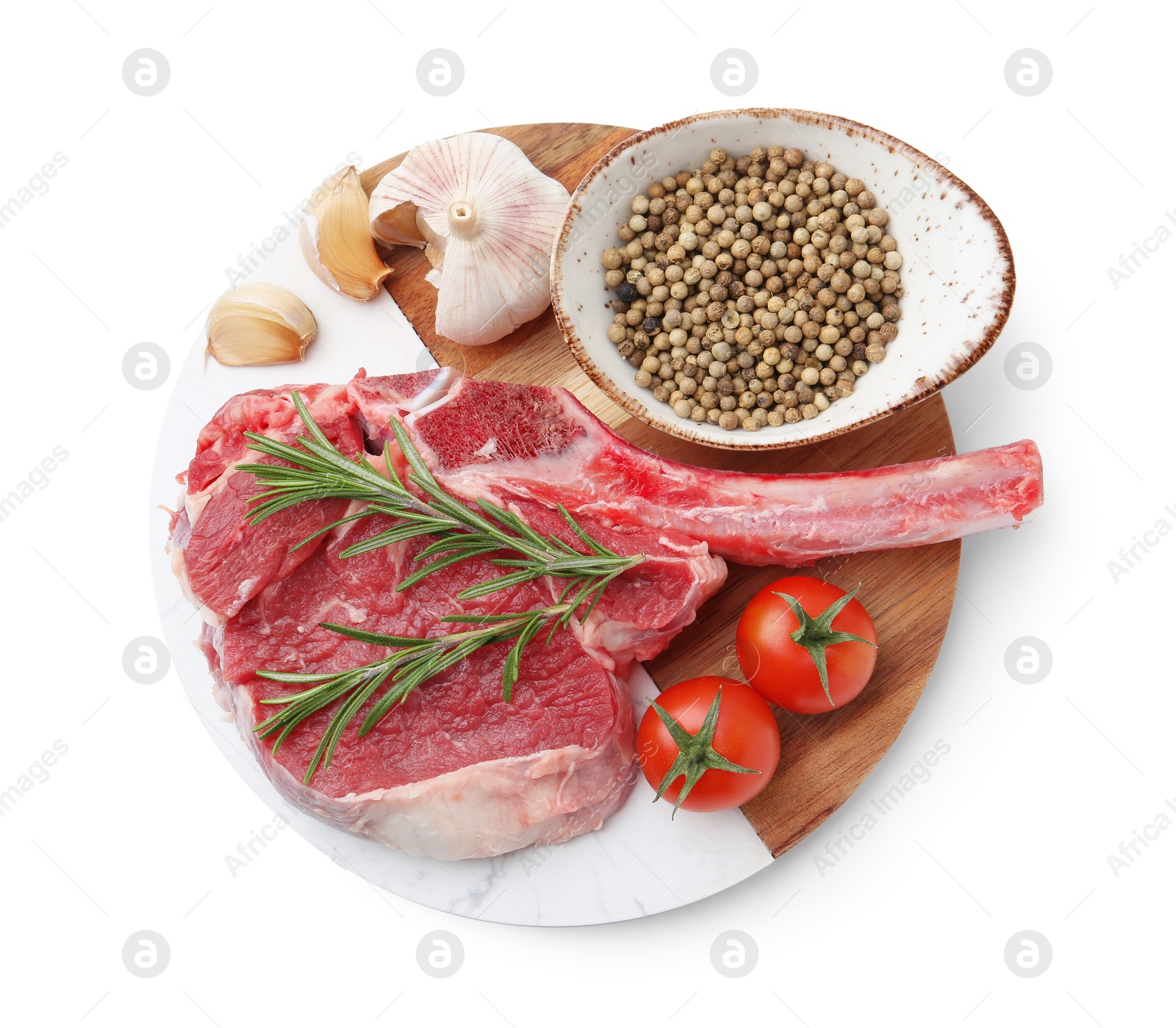 Photo of Piece of raw beef meat, spices and tomatoes isolated on white, top view