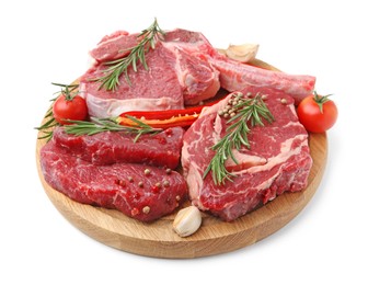 Photo of Pieces of raw beef meat, spices and tomatoes isolated on white