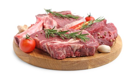 Photo of Pieces of raw beef meat, spices and tomatoes isolated on white