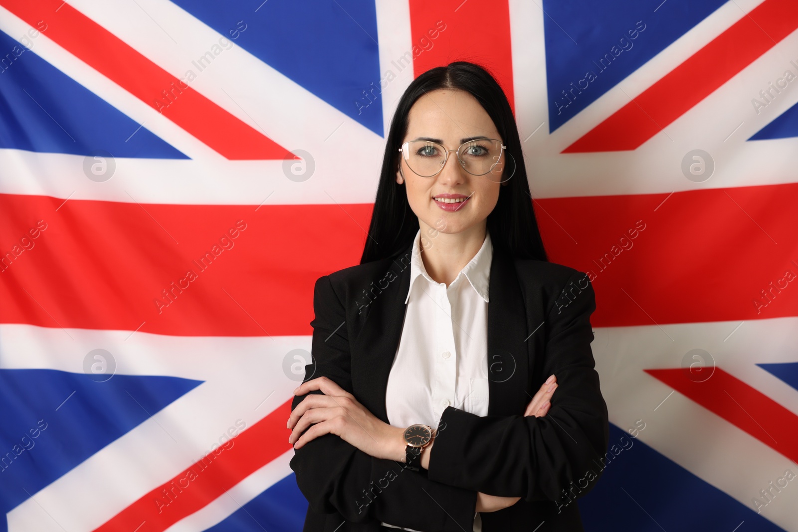 Photo of Portrait of English teacher against UK flag