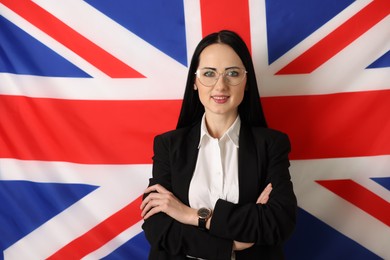 Photo of Portrait of English teacher against UK flag