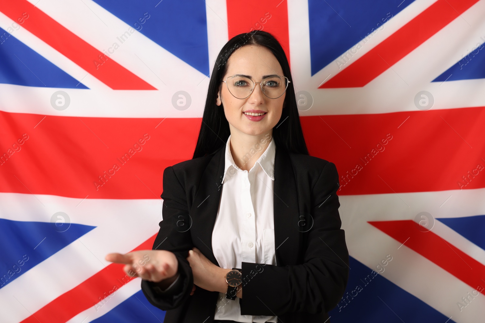 Photo of Portrait of English teacher against UK flag