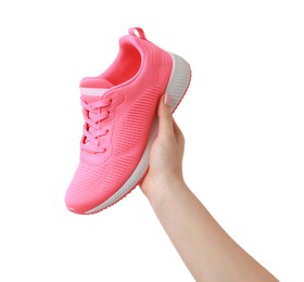 Photo of Woman with neon pink sneaker on white background, closeup