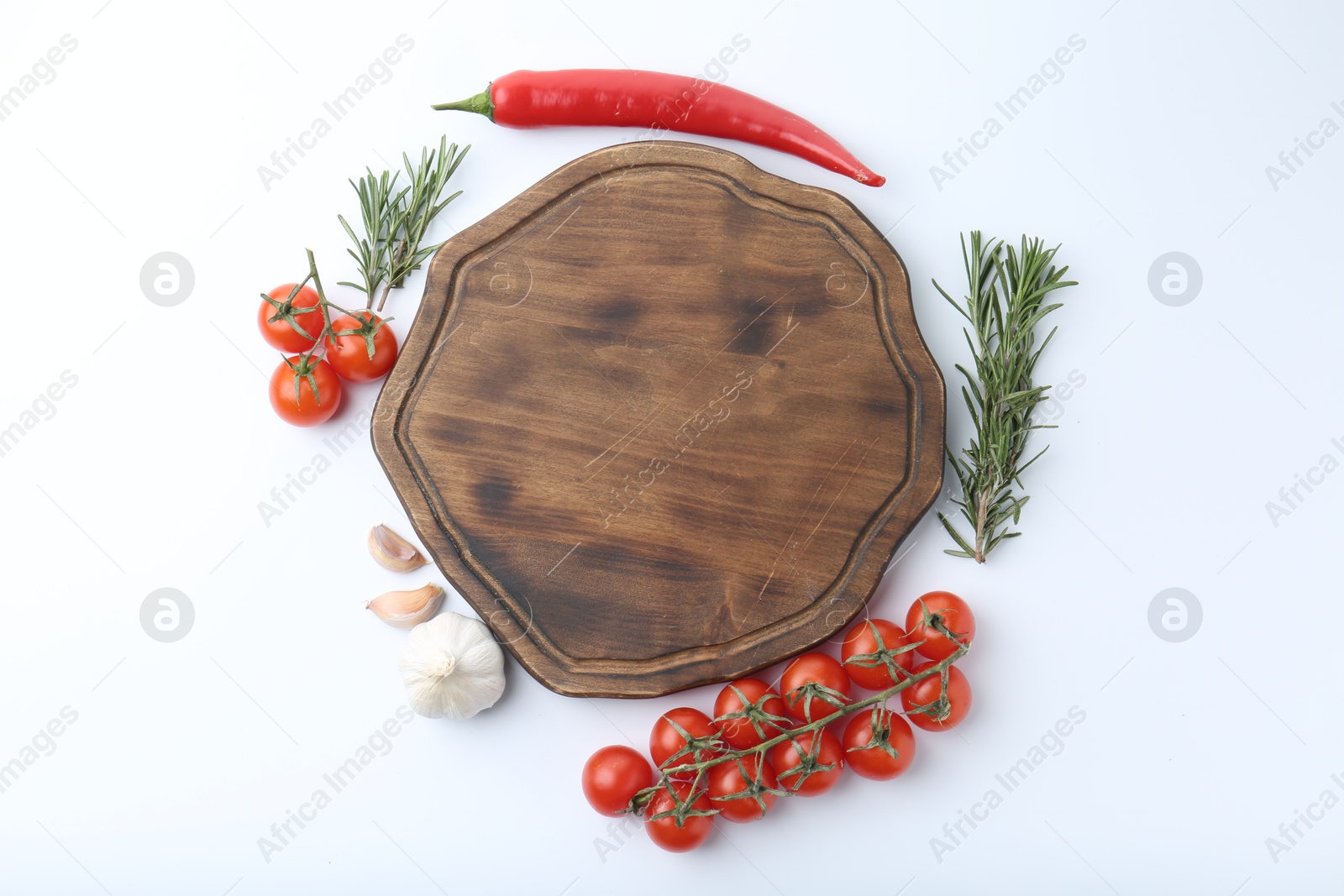 Photo of Cutting board with tomatoes and spices isolated on white, top view