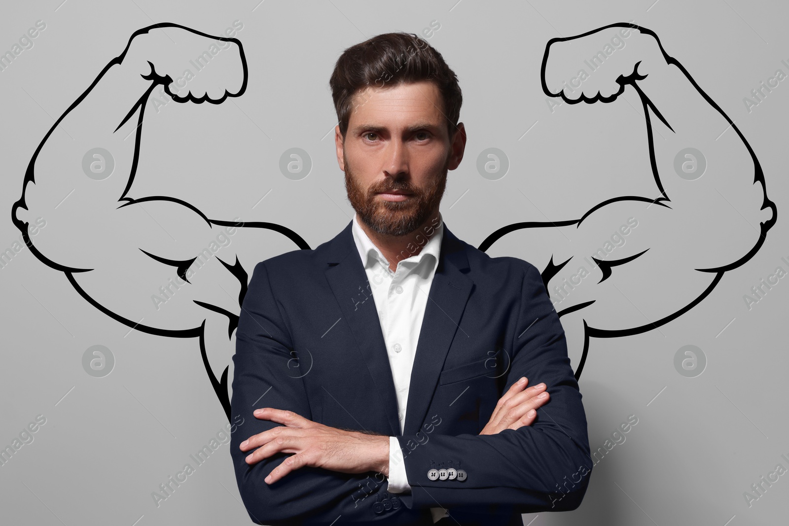 Image of Confident businessman with drawing of strong arms behind him on grey background