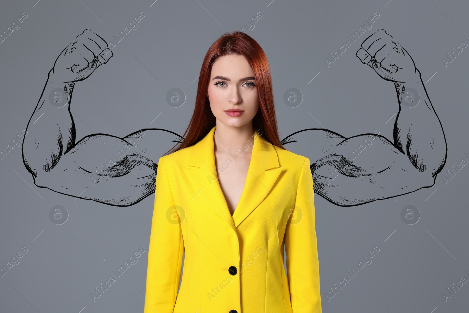 Image of Confident businesswoman with drawing of strong arms behind her on grey background