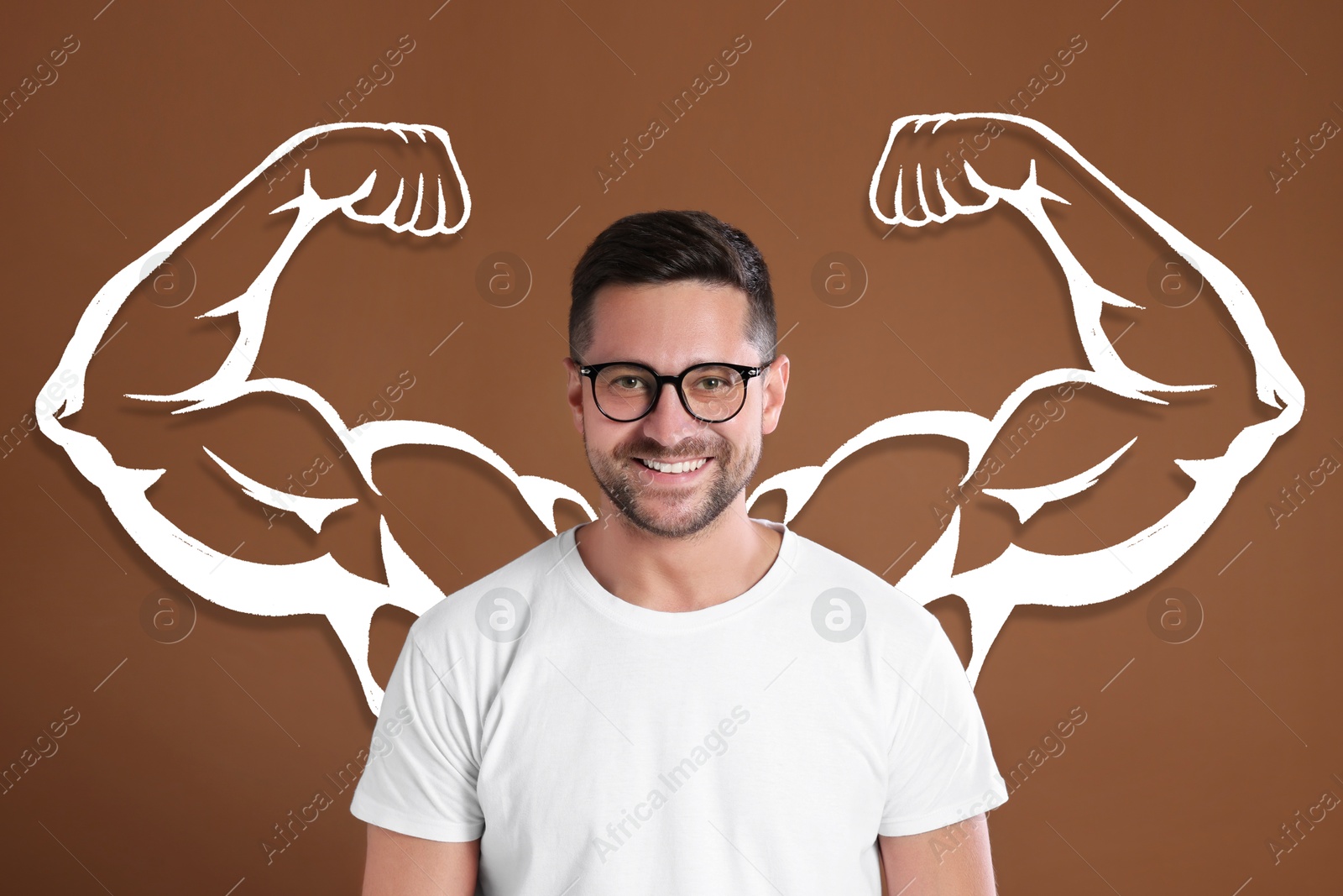 Image of Happy man with drawing of strong arms behind him on brown background