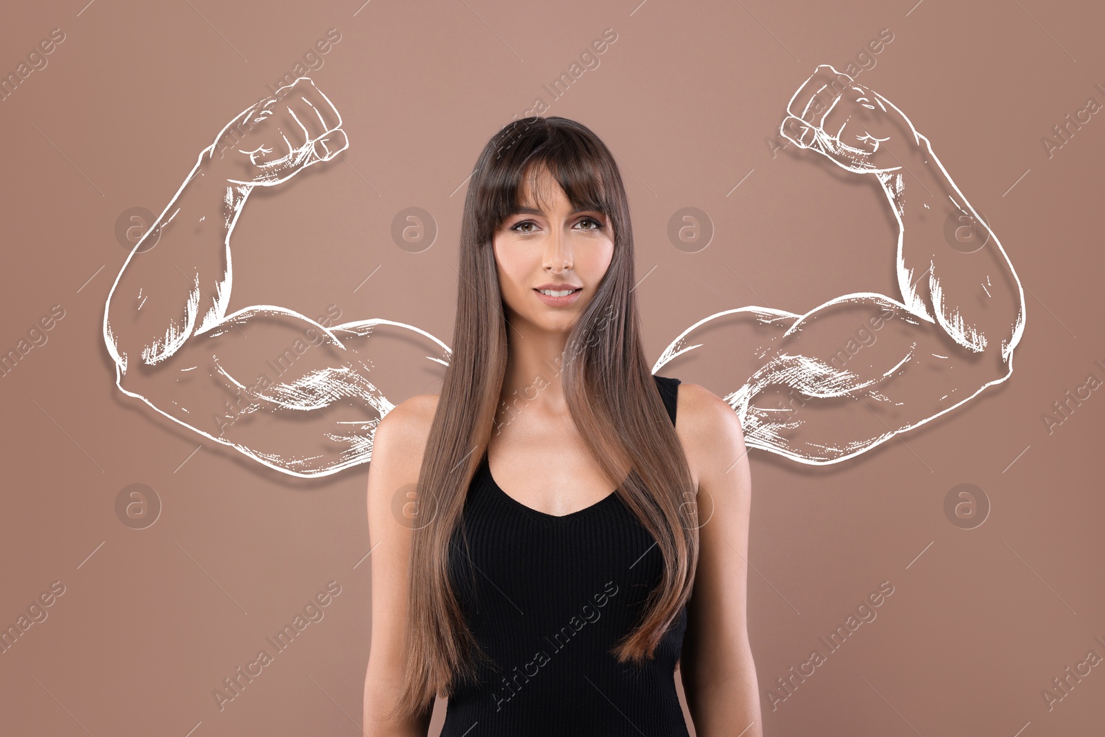 Image of Confident beautiful woman with drawing of strong arms behind her on pale brown background