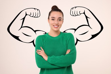 Image of Confident beautiful woman with drawing of strong arms behind her on light grey background