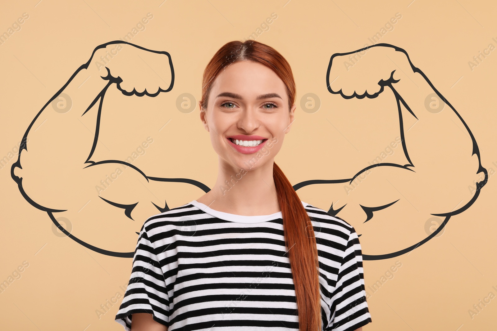 Image of Beautiful young woman with drawing of strong arms behind her on beige background