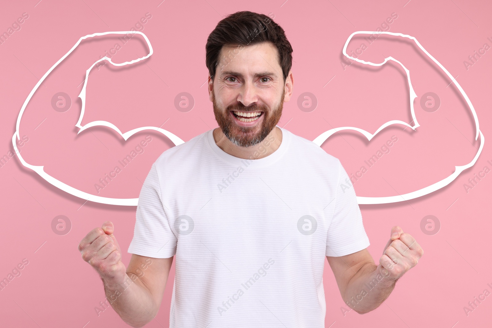 Image of Happy man with drawing of strong arms behind him on pink background