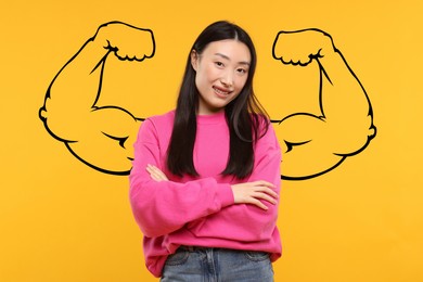 Image of Beautiful woman with drawing of strong arms behind her on orange background