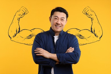 Image of Confident man with drawing of strong arms behind him on orange background