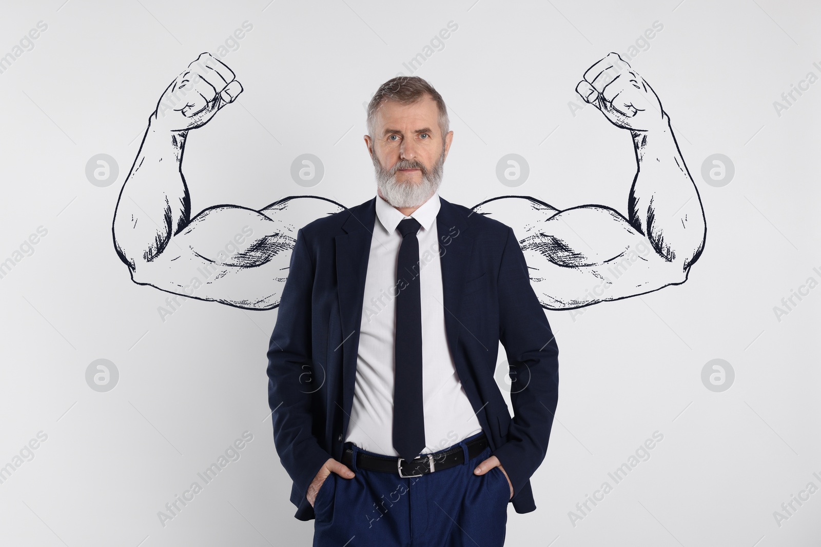 Image of Confident senior businessman with drawing of strong arms behind him on white background