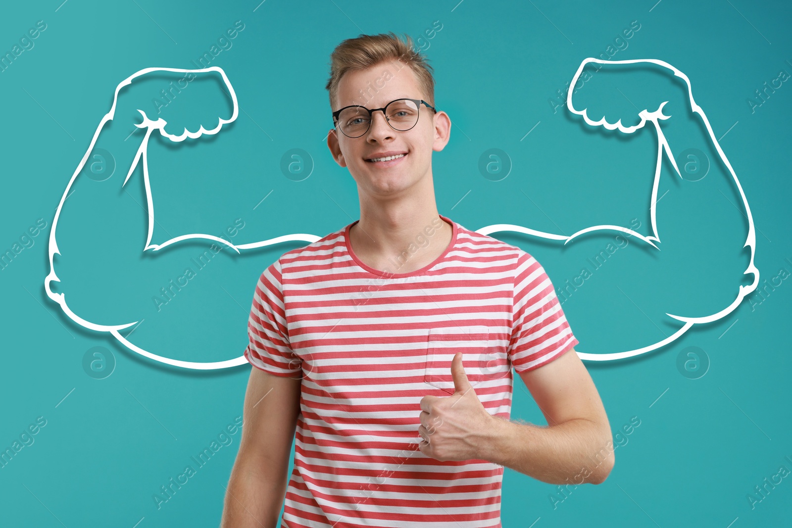 Image of Handsome young man with drawing of strong arms behind him on light blue background