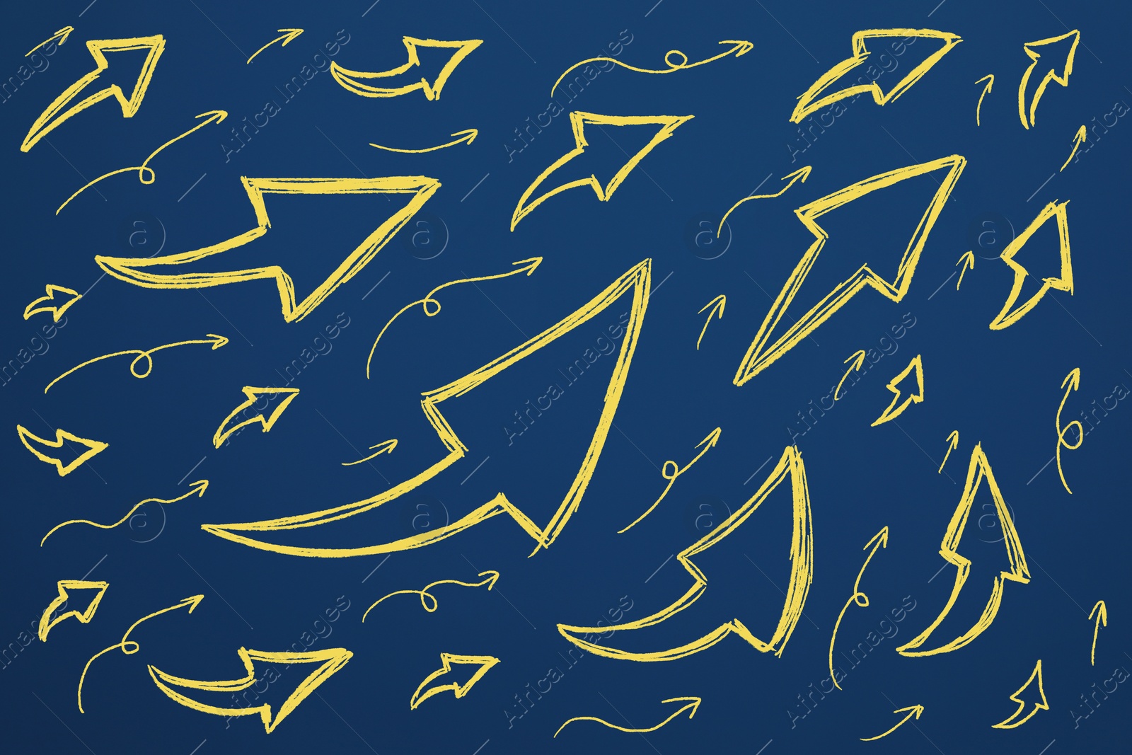 Image of Many different yellow arrows on blue background