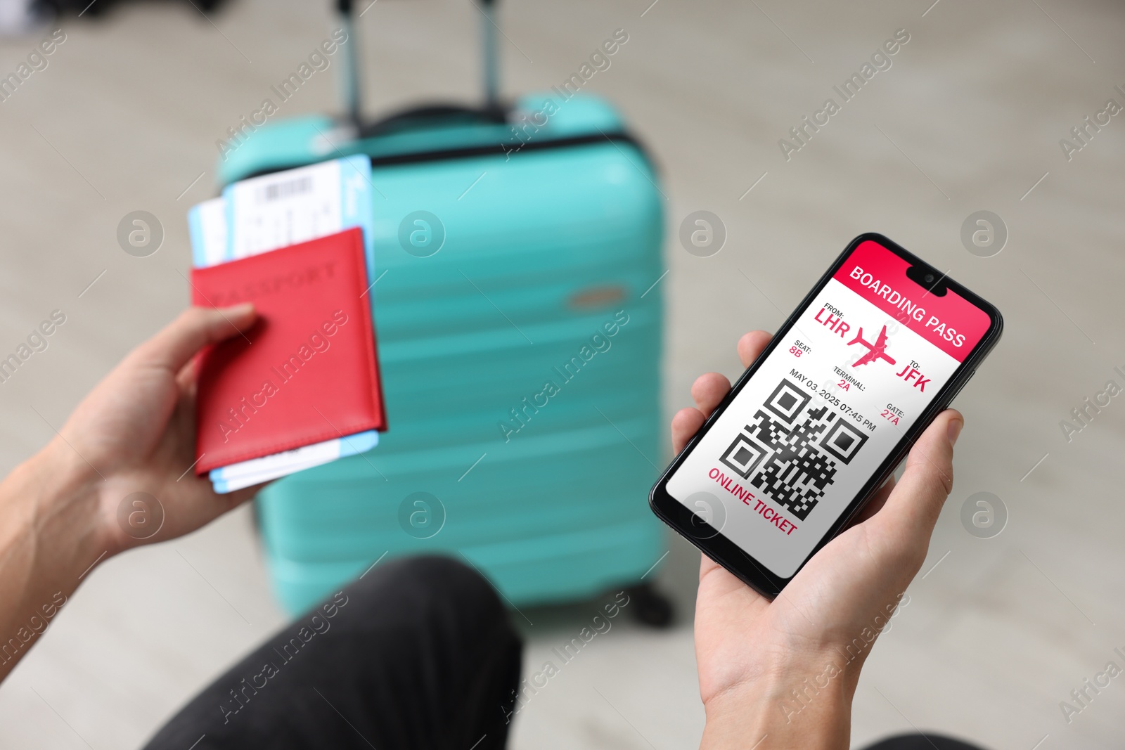 Image of Tourist with passport, flight tickets and mobile phone indoors, above view. Online ticket with QR code on device screen