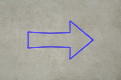 Image of One blue arrow on grey textured background