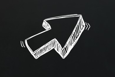 Image of One white arrow on black chalkboard. Pointer