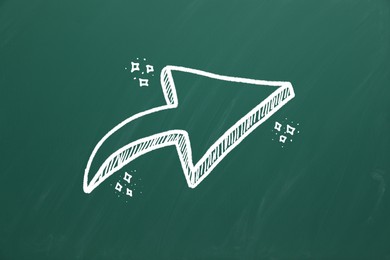 One white arrow on green chalkboard. Pointer