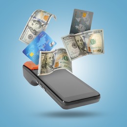 Image of Payment terminal, bank cards and dollars in air on light blue background