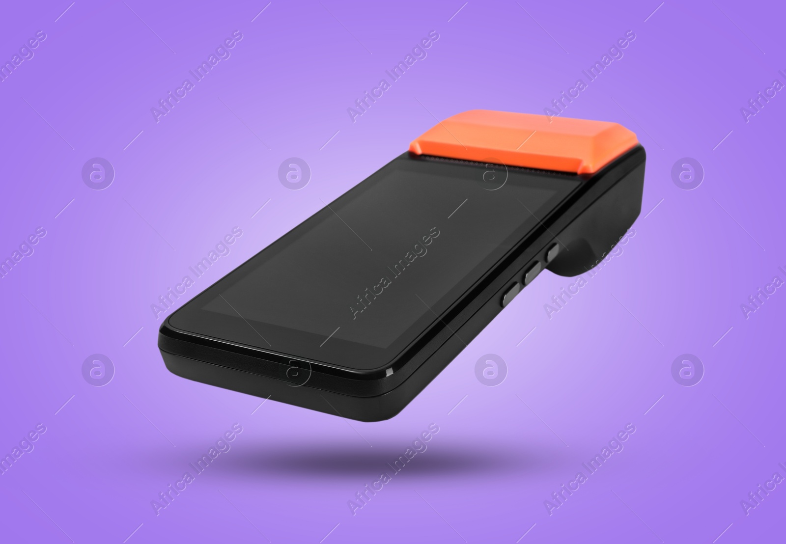 Image of Payment terminal in air on violet background