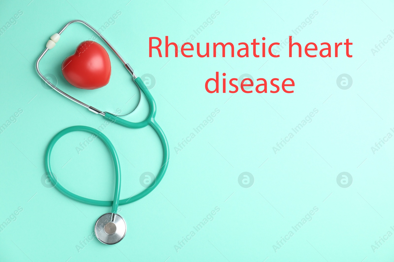 Image of Rheumatism. Stethoscope, red heart and words Rheumatic Heart Disease on turquoise background, top view