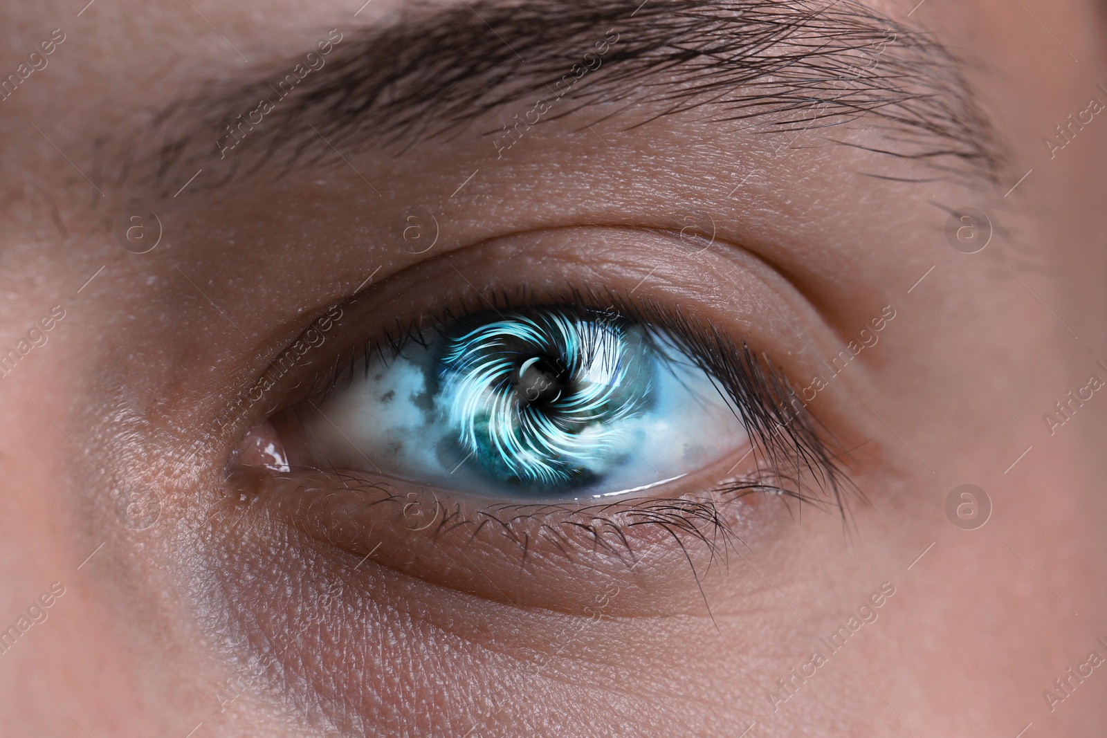 Image of Hypnosis. Hypnotic spiral and clouds in man's eye, closeup